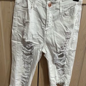 Vibrant M.I.U. white, distressed Bermuda shorts